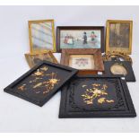 A Victorian coat of arms in distressed birds eye maple frame, two Oriental plaques,