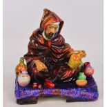 A Royal Doulton figure; HN1493 "The Potter".