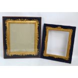 A late 19th century gilt picture frame with ribbon tied leaf decorated border,