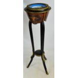 A late 19th century French ebonised and walnut gilt metal mounted jardinière stand,