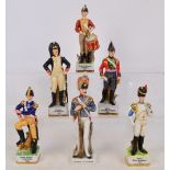 A set of five British military figures including "Captain, Infantry of the Legion 1795", "Corporal,