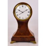 An unusual 19th century mahogany and boxwood strung sedan mantel clock,