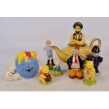 Four Royal Doulton "The Winnie The Pooh Collection" figures;