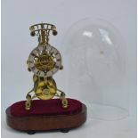 A late 19th century brass skeleton clock with silvered chapter ring set with Roman numerals,