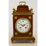 A late 19th century walnut and lacquered brass mounted eight day mantle clock,