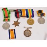 A group of five medals previously suspended on a single bar including the WWI British War Medal and