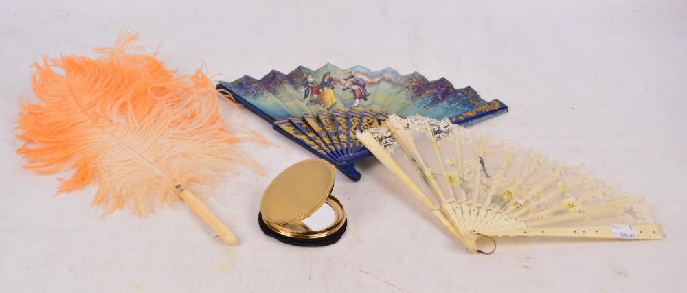 A bone and lace decorated fan, length 21cm, a further hand painted example,