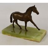 An Art Deco bronze figure of a walking horse on rectangular green onyx base, 20 x 9.5cm.