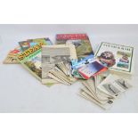 A quantity of travel ephemera and books including postcards of boats and buses,