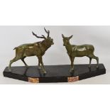 A French Art Deco bronze mantelpiece depicting a stag and a hind,