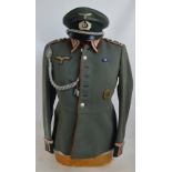 A period German Third Reich artillery sergeant 51 regiment waffenrock plus cap.