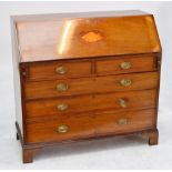 A Georgian mahogany bureau, the fall front inlaid with a conch shell,