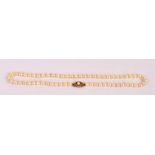 A strand of Ciro cultured pearls of uniform size with 9ct yellow gold and cultured pearl clasp,