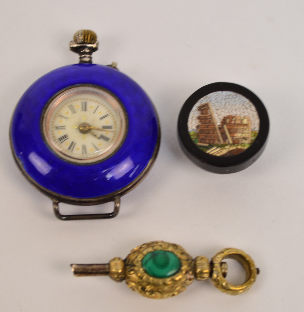 A late 19th century open face lady's crown wind fob watch with overall blue guilloche enamel