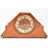 An Art Deco walnut cased triple chime mantel clock,