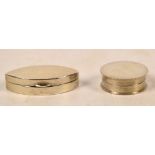 A Victorian hallmarked silver circular pill box of plain form with milling to both edges,