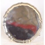 A George VI hallmarked silver shaped circular salver with piecrust rim,