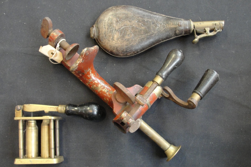 A collection of shooting related items including a combination rollover tool, a leather shot flask, - Image 3 of 4