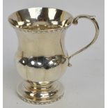 A mid 19th century American silver campana shaped christening mug,