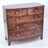 A George IV mahogany and crossbanded chest of two short and three long drawers on splayed bracket