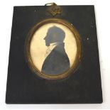 UNATTRIBUTED; a Victorian silhouette painting of a Regency gentleman in an ebonised frame,