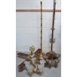 Two gilt metal standard lamps of similar height,