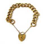 A 9ct yellow gold link bracelet with padlock attachment, approx 54g.