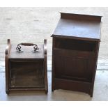 An oak coal scuttle (af) and an early 20th century stained freestanding coal bin, height 60cm (2).