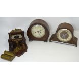 Two mid twentieth century oak cased mantel clocks to include an Enfield 8 day example,