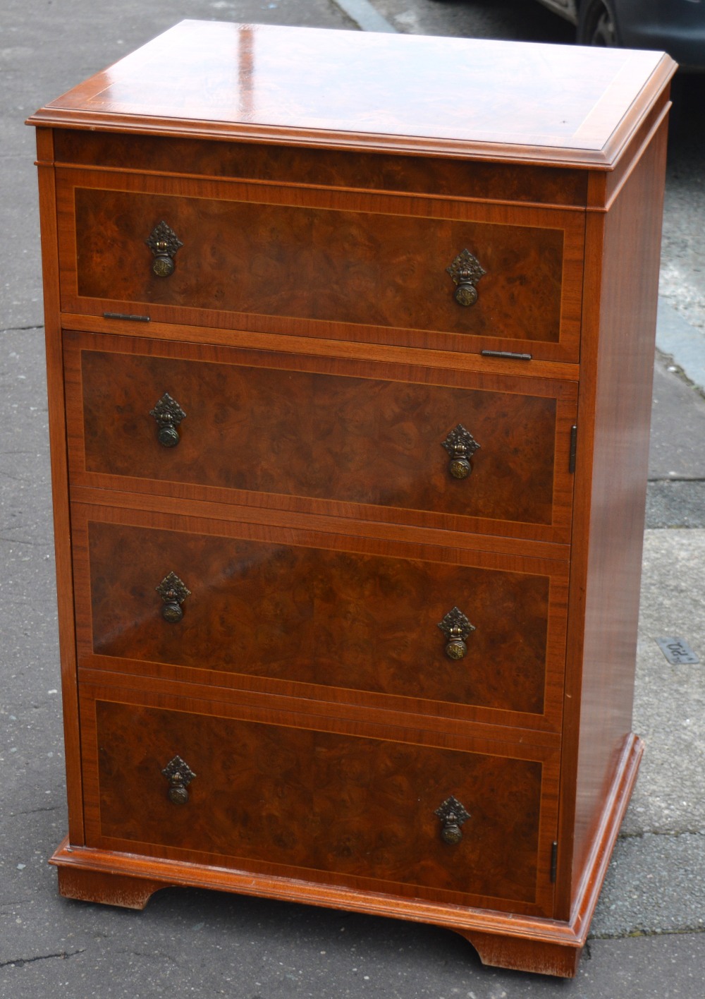 A walnut HMV record cabinet with Charles Sheraton of Leeds label to interior with four false