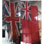 A red ship's ensign flag and a Union Jack flag formerly of a ship that sailed out of Bristol,