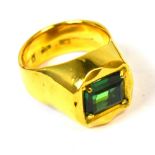 A gentleman's 18ct gold dress ring set with an emerald cut emerald, size S, approx 25g.