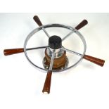 A vintage five-spoke yacht wheel with bracket attachments, diameter approx 40cm.