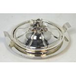 A hallmarked silver shallow dish made of two parts,