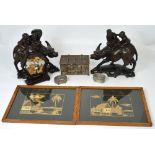 A pair of Chinese carved rootwood figure groups depicting two figures upon the back of an ox,