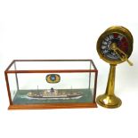 A scratch-built scale model ship in glazed display case,