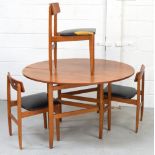 A G-Plan style drop-leaf dining table on tapered legs and a set of three matching chairs (4).