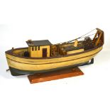 A model of a fishing boat complete with nets, length 56cm.