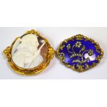 A 19th century cameo of a classical image set in a yellow metal scrolling ornate mount (af) and a