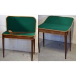 A pair of rectangular mahogany and satinwood crossbanded George IV style foldover tea/games tables