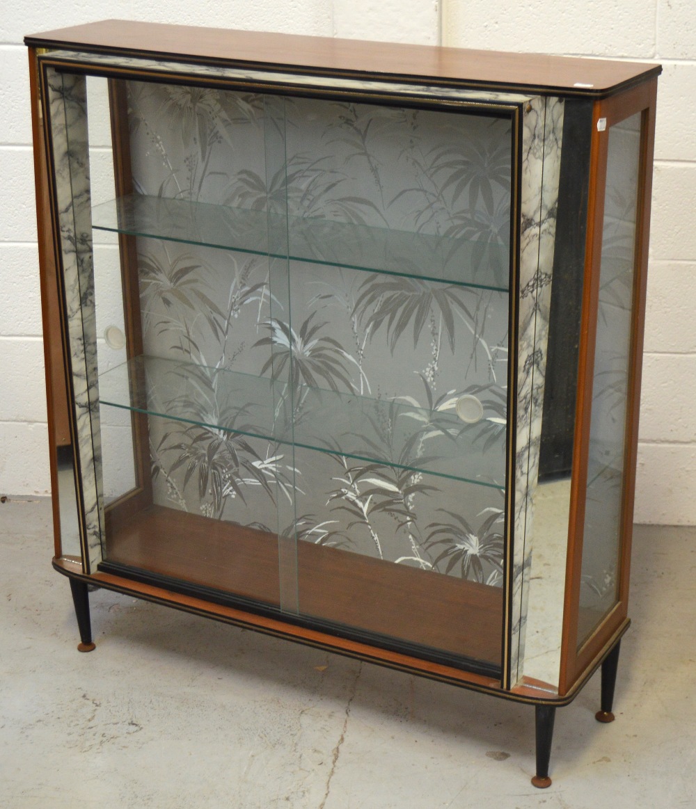 A retro display cabinet on rounded tapering legs, width 99cm.