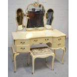 A French style cream triple mirror back dressing table,