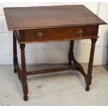 An 18th century Continental oak side table with single drawer and ring turned supports with