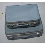 Two vintage Antler pale blue suitcases, varying sizes (2).