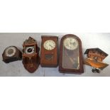 Three wall clocks to include an early 20th century oak cased example,