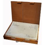 Approximately one hundred and fifty maps in a case with carrying handle.