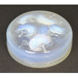 A Lalique iridescent glass circular box and cover decorated in the 'Houpes' pattern,
