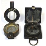 Two military compasses, one T.G. Co. Ltd. London no.