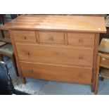 A modern pine sideboard, three small drawers over two long lower drawers.