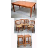 A modern pine kitchen table, length 140cm, with four matching chairs and two bar stools (7).